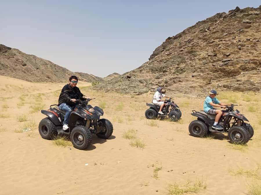 Jeddah Desert Safari: Quad Biking, Camel Farm & Sunset Views - Meeting camels at a local farm