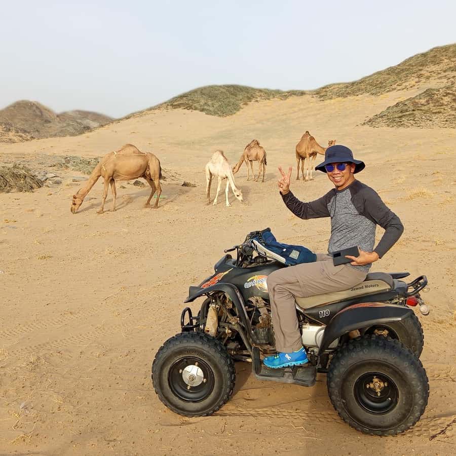 Jeddah Desert Safari: Quad Biking, Camel Farm & Sunset Views - Sunset photos, mountain views, and ten minutes of tea
