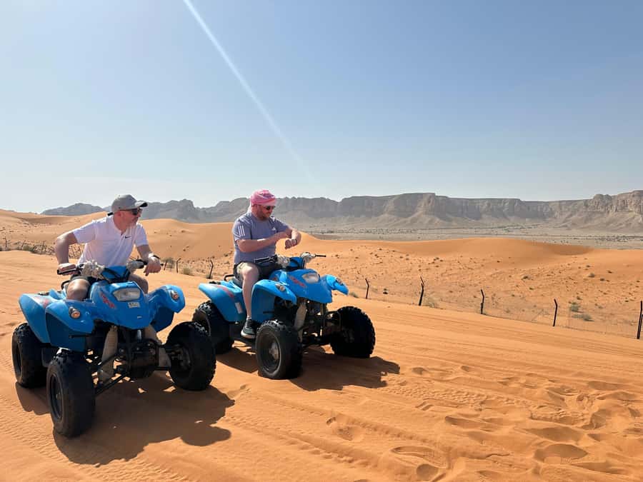 Red Sand: Dunes ATV, + Camel Ride + sandboarding - Sandboarding on soft, shifting sand