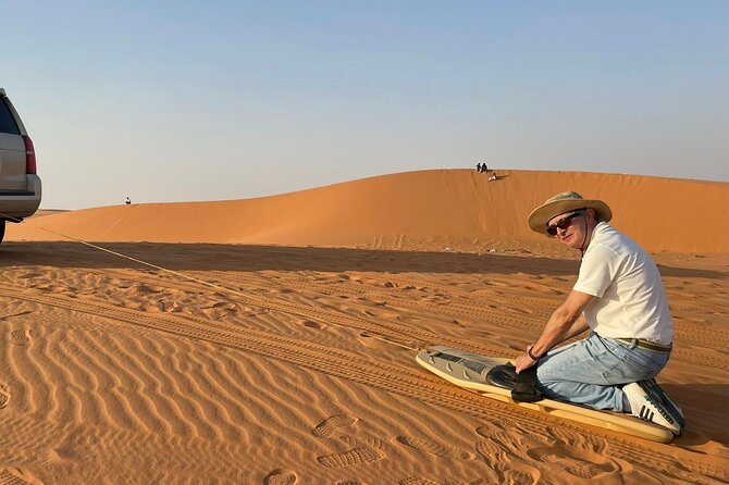 Red Sand Dunes Tour with Camel Ride ,Quad Biking, Heritage House - Sandboarding, volleyball, archery, and desert games